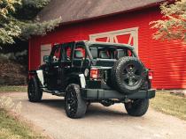 2.75 Inch Cat-Back Dual Rear Exit with Single 4.0 Inch Polished Flat Cut Tips with USA Flag Etch 07-18 Jeep Wrangler JKU 116 Inch Wheel Base Corsa Performance